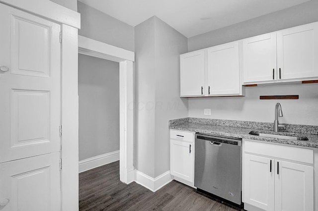 126 E 6th Ave Unit 126, Columbus, OH 43201 - kitchen featuring stainless steel dishwasher, light stone countertops, dark wood-type flooring, and white cabinets