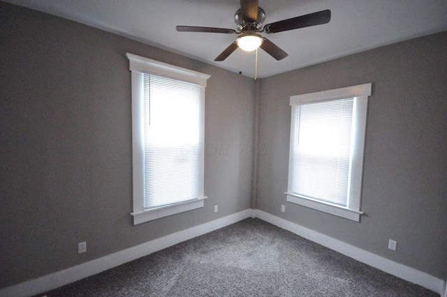 126 E 6th Ave Unit 126, Columbus, OH 43201 - carpeted empty room with healthy amount of natural light and a ceiling fan