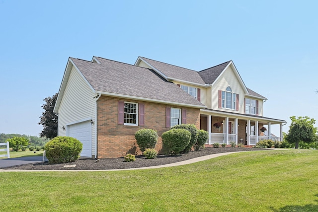 6281 Davis Dr, Newark, OH 43056 - view of front of property featuring brick siding, a garage, a porch, a front yard, and roof with shingles