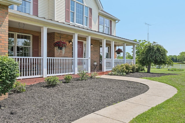 6281 Davis Dr, Newark, OH 43056 - property entrance featuring brick siding and a porch
