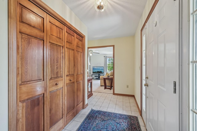 6281 Davis Dr, Newark, OH 43056 - entryway featuring light tile patterned floors and a ceiling fan