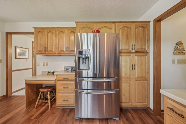6281 Davis Dr, Newark, OH 43056 - kitchen with stainless steel refrigerator with ice dispenser, dark wood-style floors, light countertops, and a textured ceiling