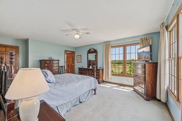 6281 Davis Dr, Newark, OH 43056 - bedroom featuring light colored carpet and ceiling fan