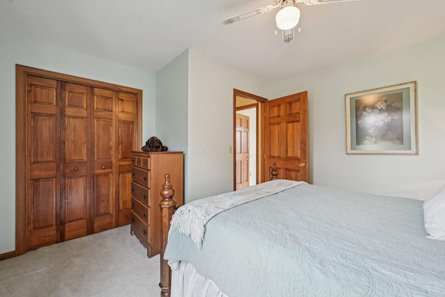 6281 Davis Dr, Newark, OH 43056 - bedroom with light carpet, ceiling fan, and a closet