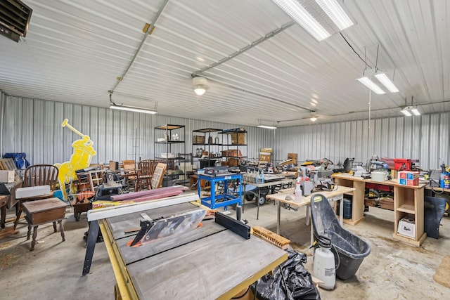 6281 Davis Dr, Newark, OH 43056 - garage featuring metal wall and a workshop area