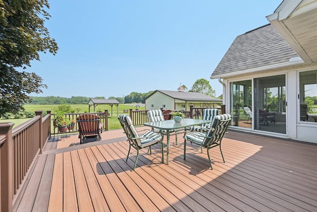 6281 Davis Dr, Newark, OH 43056 - deck featuring outdoor dining area and a sunroom