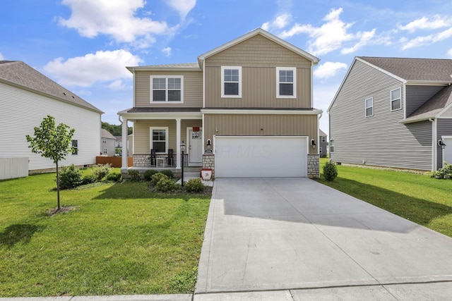 235 Old Bay Dr, Pataskala, OH 43062 - view of front of home featuring covered porch, a front lawn, driveway, and stone siding