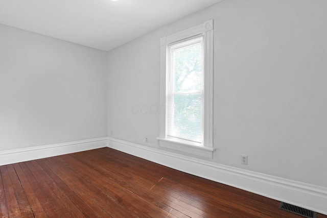 611 E 11th Ave, Columbus, OH 43211 - unfurnished room with dark wood finished floors