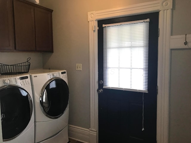 617 E 11th Ave, Columbus, OH 43211 - laundry area featuring washer and clothes dryer and cabinet space