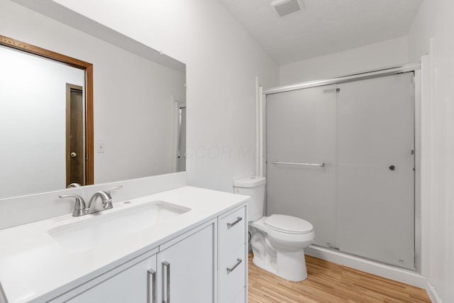 5198 Dierker Rd Unit D, Columbus, OH 43220 - bathroom with vanity, wood finished floors, and a stall shower