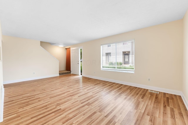 5198 Dierker Rd Unit D, Columbus, OH 43220 - unfurnished living room featuring light wood-type flooring and baseboards