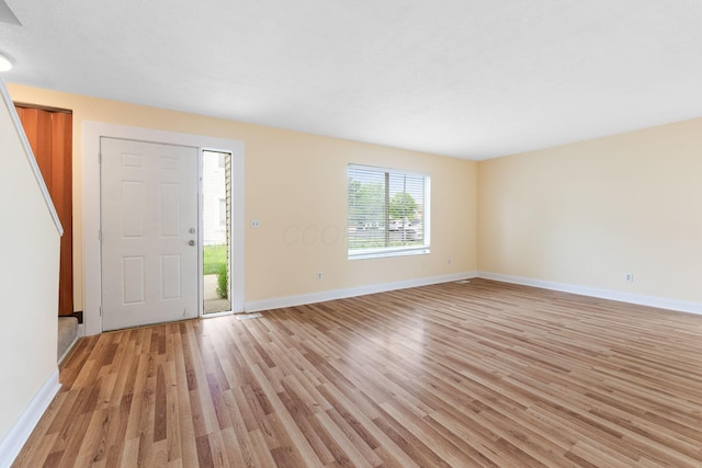 5198 Dierker Rd Unit D, Columbus, OH 43220 - entryway with light wood-style flooring and baseboards