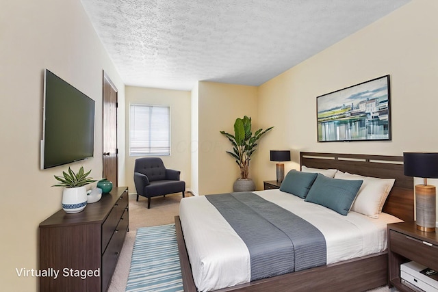 5198 Dierker Rd Unit D, Columbus, OH 43220 - bedroom with a textured ceiling and carpet