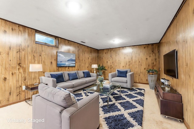 5198 Dierker Rd Unit D, Columbus, OH 43220 - living area with wooden walls and light colored carpet