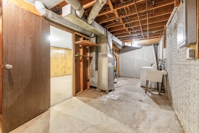 5198 Dierker Rd Unit D, Columbus, OH 43220 - unfinished basement with heating unit and washer / dryer