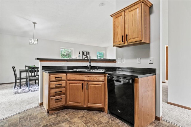 1280 Kariba Dr, Columbus, OH 43207 - kitchen featuring dishwasher, dark countertops, and brown cabinets