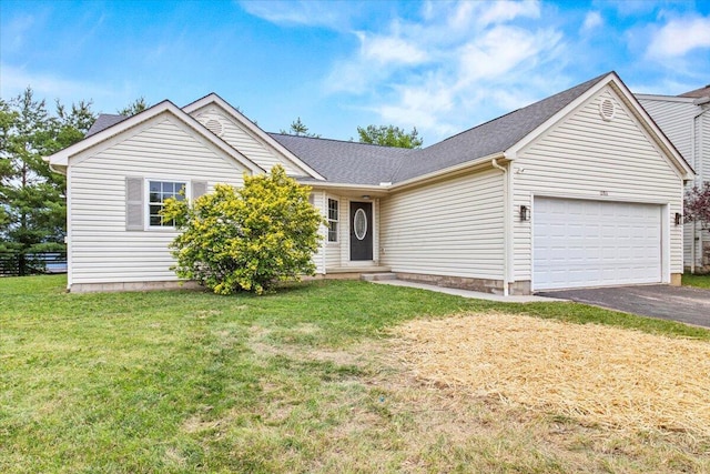 1280 Kariba Dr, Columbus, OH 43207 - ranch-style home featuring a garage, asphalt driveway, and a front lawn