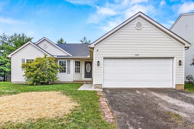 1280 Kariba Dr, Columbus, OH 43207 - ranch-style house featuring an attached garage, driveway, and a front lawn