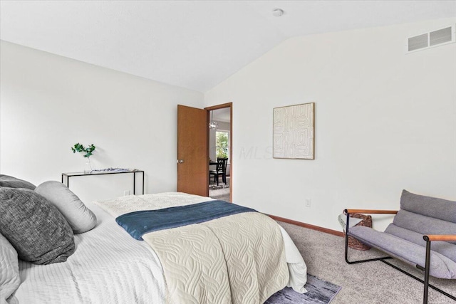 1280 Kariba Dr, Columbus, OH 43207 - carpeted bedroom featuring vaulted ceiling and baseboards