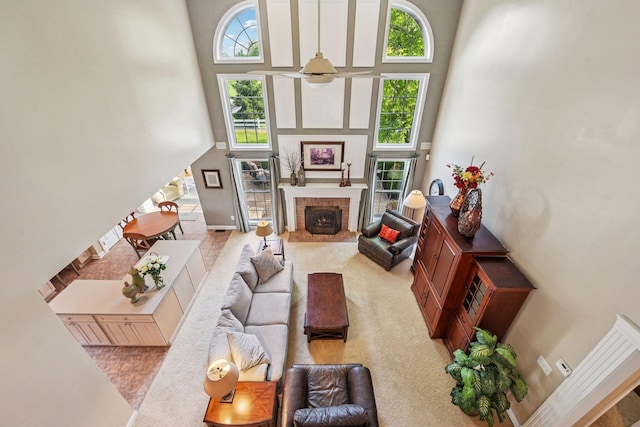 6150 Heritage Lakes Dr, Hilliard, OH 43026 - living room featuring a high ceiling and a brick fireplace
