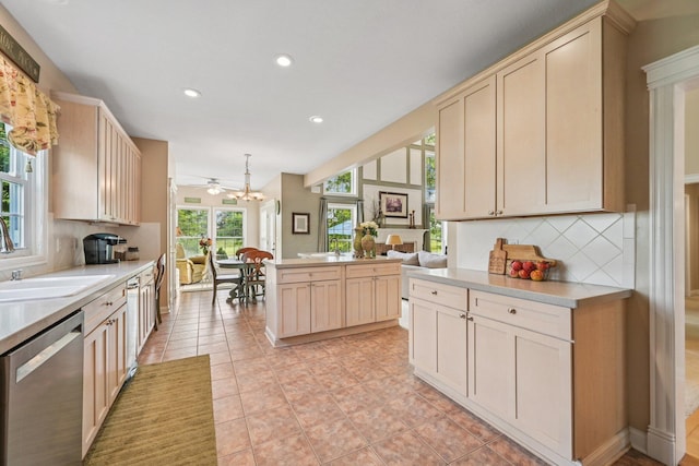6150 Heritage Lakes Dr, Hilliard, OH 43026 - kitchen featuring dishwasher, backsplash, recessed lighting, light countertops, and light tile patterned floors