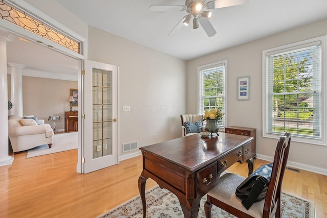 6150 Heritage Lakes Dr, Hilliard, OH 43026 - home office featuring light wood finished floors, ceiling fan, and decorative columns
