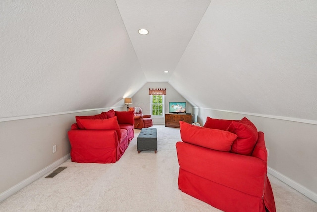 6150 Heritage Lakes Dr, Hilliard, OH 43026 - living room featuring vaulted ceiling, carpet, and recessed lighting