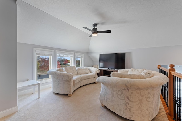 6037 Baronscourt Way, Dublin, OH 43016 - living room with light carpet, a ceiling fan, lofted ceiling, and a textured ceiling