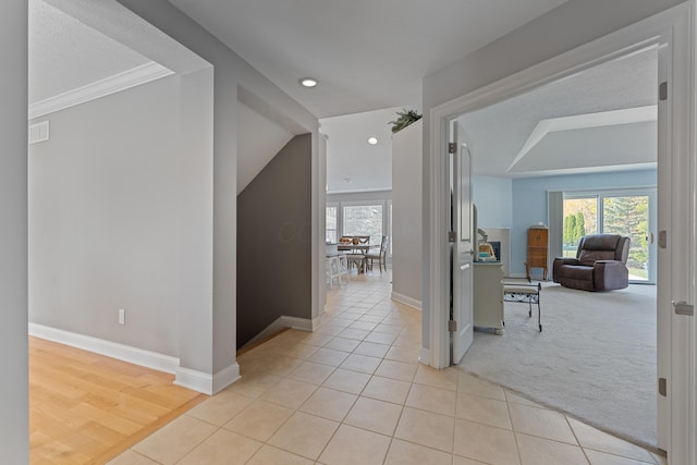 6037 Baronscourt Way, Dublin, OH 43016 - corridor with plenty of natural light, light tile patterned floors, recessed lighting, and light carpet