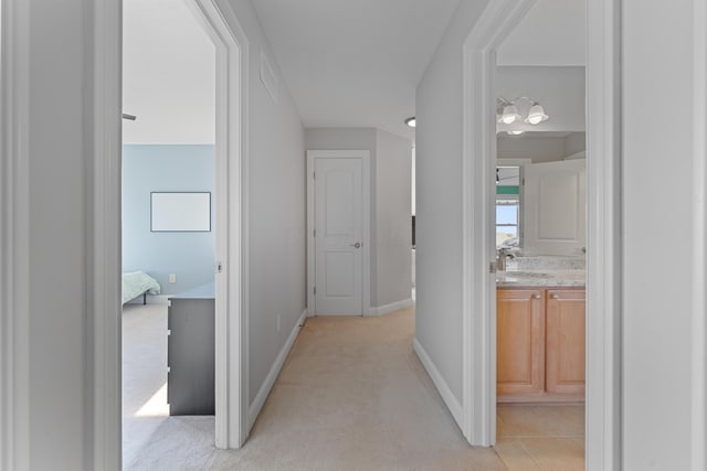 6037 Baronscourt Way, Dublin, OH 43016 - hall featuring a sink and light carpet