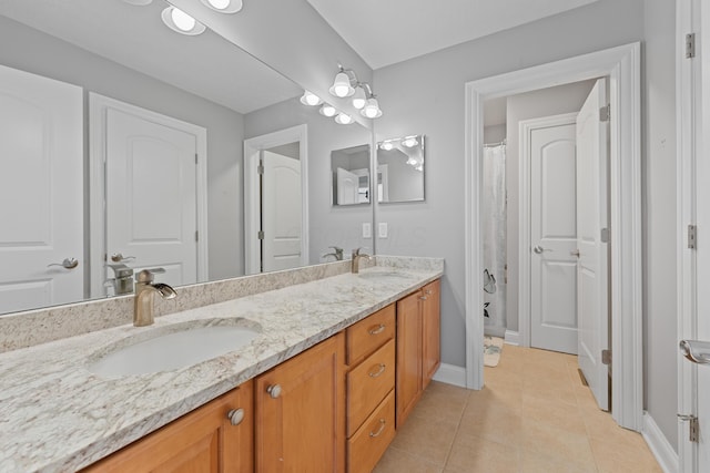 6037 Baronscourt Way, Dublin, OH 43016 - bathroom featuring double vanity, tile patterned floors, and curtained shower