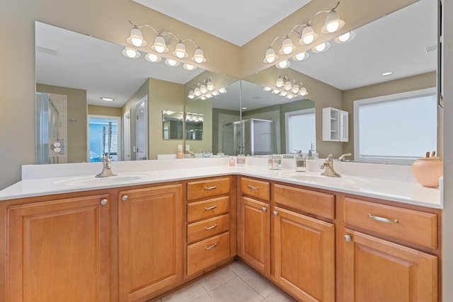 6037 Baronscourt Way, Dublin, OH 43016 - full bathroom featuring a shower stall, double vanity, and tile patterned floors