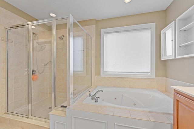 6037 Baronscourt Way, Dublin, OH 43016 - bathroom featuring a tub with jets, a shower stall, and vanity