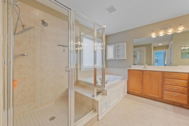 6037 Baronscourt Way, Dublin, OH 43016 - full bath with tile patterned floors, vanity, a bath, and a shower stall