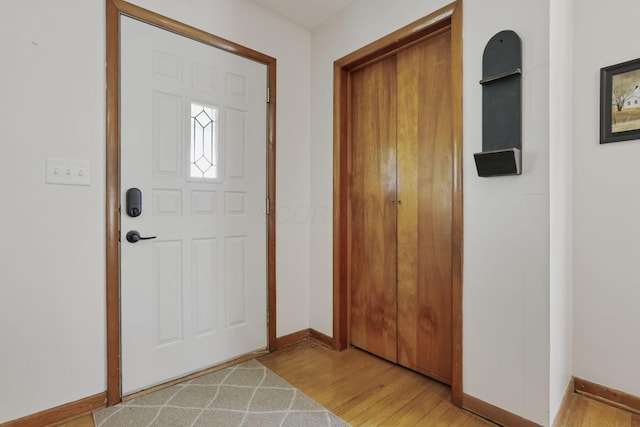 17519 Thompson Ridge Rd, Laurelville, OH 43135 - foyer featuring light wood-style floors and baseboards
