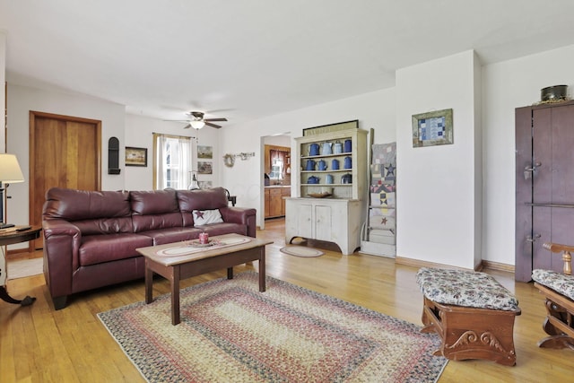 17519 Thompson Ridge Rd, Laurelville, OH 43135 - living area with light wood-type flooring and a ceiling fan