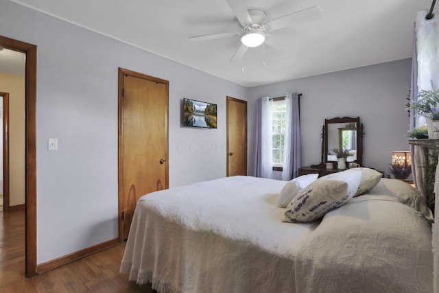 17519 Thompson Ridge Rd, Laurelville, OH 43135 - bedroom featuring dark wood-type flooring and ceiling fan