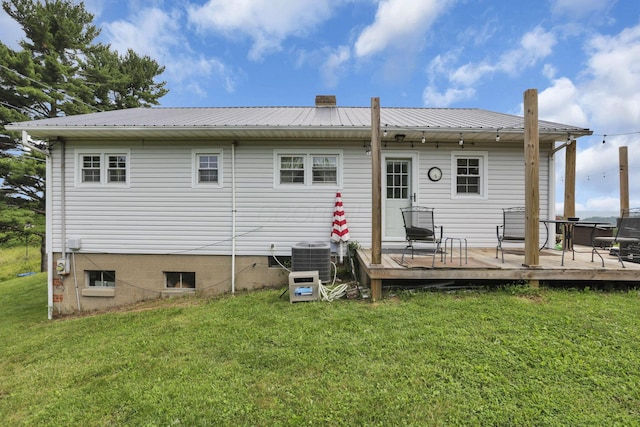 17519 Thompson Ridge Rd, Laurelville, OH 43135 - back of house with a yard, a deck, a metal roof, and a chimney