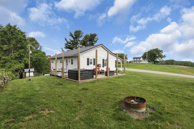 17519 Thompson Ridge Rd, Laurelville, OH 43135 - view of side of home featuring a lawn, an outdoor living space, a patio area, and a storage unit