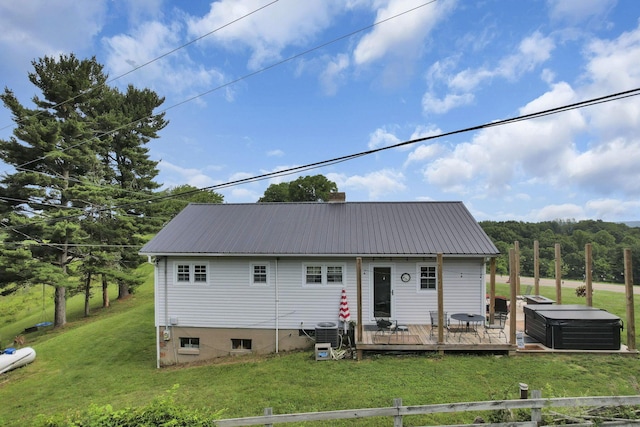 17519 Thompson Ridge Rd, Laurelville, OH 43135 - rear view of house with a deck, a metal roof, and a yard