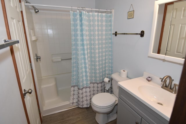566 Deanna Stroll Rd, Heath, OH 43056 - full bathroom with vanity, shower / tub combo with curtain, and wood finished floors
