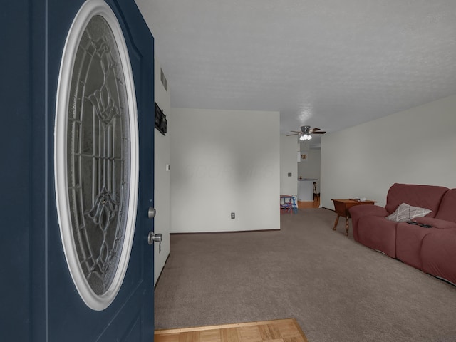566 Deanna Stroll Rd, Heath, OH 43056 - foyer entrance featuring a ceiling fan and carpet