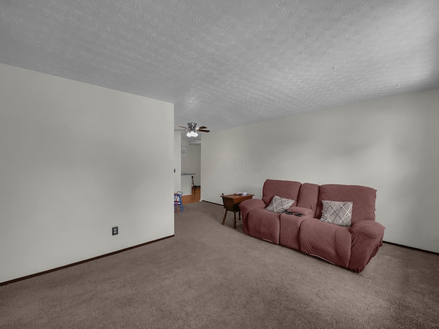 566 Deanna Stroll Rd, Heath, OH 43056 - living area with carpet floors, a textured ceiling, and a ceiling fan