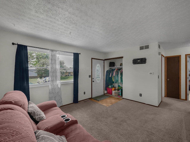 566 Deanna Stroll Rd, Heath, OH 43056 - living room with carpet floors and a textured ceiling