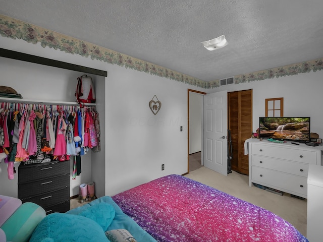 566 Deanna Stroll Rd, Heath, OH 43056 - bedroom featuring a textured ceiling, light colored carpet, and a closet