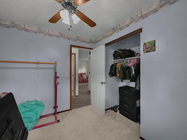 566 Deanna Stroll Rd, Heath, OH 43056 - bedroom featuring light colored carpet, a closet, and ceiling fan