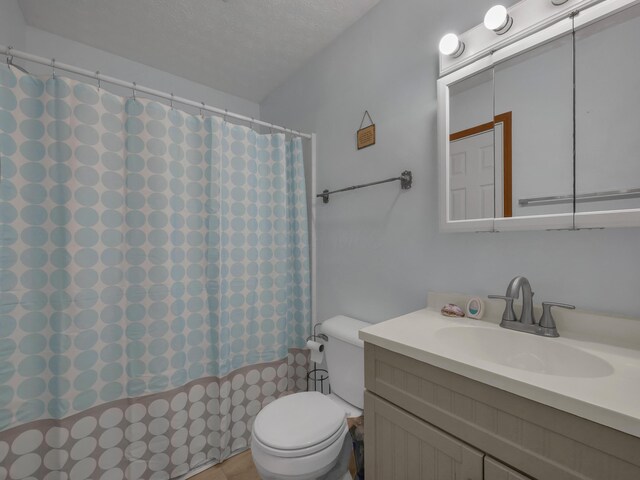 566 Deanna Stroll Rd, Heath, OH 43056 - full bathroom featuring vanity, a shower with curtain, and a textured ceiling