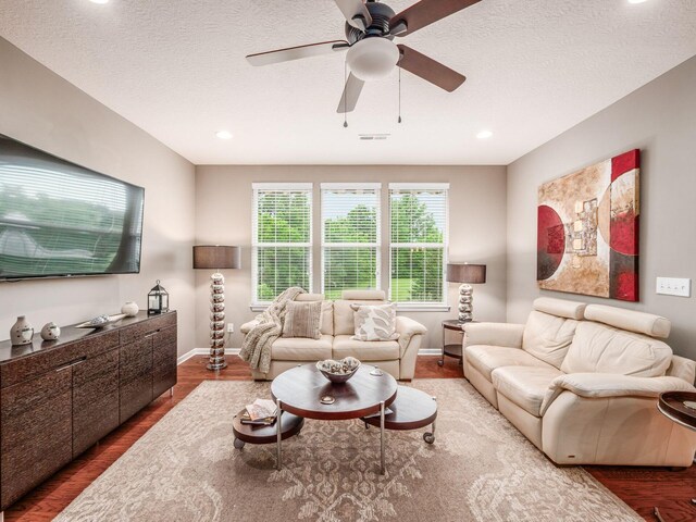 8105 Jitterbug Ln, Pickerington, OH 43147 - living area featuring wood finished floors, a ceiling fan, recessed lighting, and a textured ceiling