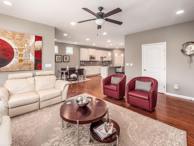 8105 Jitterbug Ln, Pickerington, OH 43147 - living area with dark wood-style floors, ceiling fan, and recessed lighting