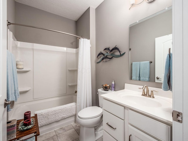 8105 Jitterbug Ln, Pickerington, OH 43147 - bathroom featuring vanity, shower / bath combo with shower curtain, a textured ceiling, and tile patterned flooring
